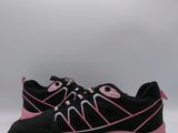 a close up of a pair of black and pink shoes