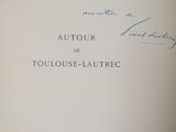 an open book with a handwritten title on the front of it
