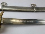 pair of silver and gold - plated swords with the words don ' t never be fool written on them