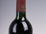 a bottle of wine that is sitting on a table