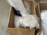 a cardboard box full of items that are sitting on the floor