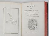 an open book with a drawing of a man on it