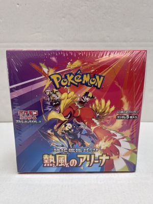 a close up of a box of pokemon cards on a table