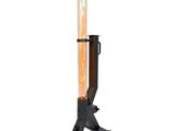 a black and orange fire pit sitting on top of a metal stand
