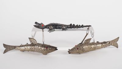 two fish that are sitting on top of each other