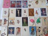 a lot of cards on the table with pictures on them