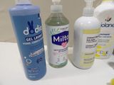 many different types of hand sanitizers on the counter