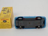 a toy car that is sitting next to a box