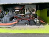 a close up of a machine that has many wires on it