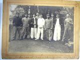 an old photo of a group of men posing for a picture