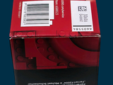 a red box that has a black and white label on it