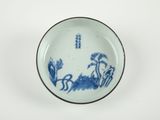 bol en porcelaine bleue et blanche orné d'un motif représentant des oiseaux et des fleurs