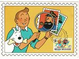 a stamp with a picture of a man holding a dog and magnifying a magnifying glass