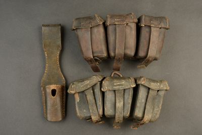 a group of old metal items that are on a table