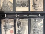 four pictures hanging on the wall of a building