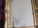a mirror that is sitting on a carpet