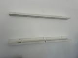 a white shelf that has two white shelves on it