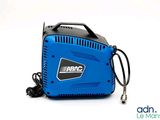 an image of a blue and black air compressor sitting on top of a white surface