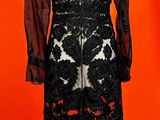 black and white lace dress on a mannequin mannequin mannequin mannequin mannequin mannequin mannequin mannequin mann