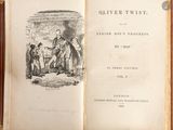 an old book with a picture of a group of people in it