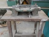 a machine that is sitting on a table in a factory