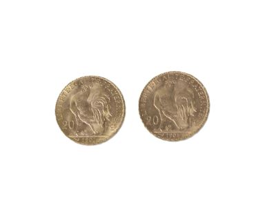 an image of two gold coins on a white background