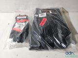 two pairs of gloves that are wrapped in plastic