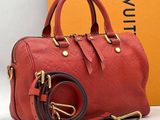 louis vu vu red leather handbag with gold hardware and strap