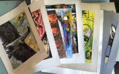 a lot of different pictures on the table together