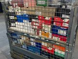 a large metal cart with many items in it