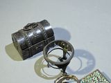 two rings that are sitting on top of a box
