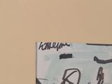 a picture of a painting on the wall of a bathroom