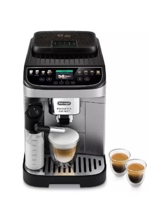 gros plan d'une machine à café avec deux tasses de café