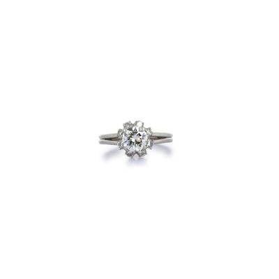 Bague « Fleur » en fils de platine 850‰ et diamant taille br…