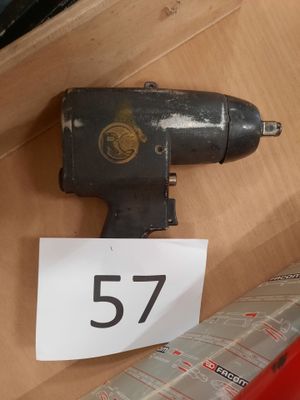 a box with a drill and a box with a label on it