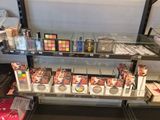 a lot of makeup products on the shelves in the store
