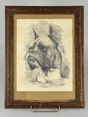 an old picture of a dog in a frame on a wall