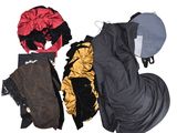 a pile of clothing that is laying out on the ground