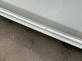 a picture of a car with a dent in the side