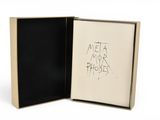 a black and white picture of a box with writing on it