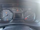 a close up of a car dashboard with a speedometer and gauges