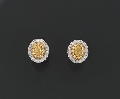 Paire de puces d'oreilles en or gris 18k 750 millièmes serti…