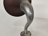 a metal object that is sitting on top of a table