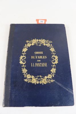 la couverture d'un livre bleu orné d'un motif doré