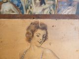 a picture of a woman in a bathing suit on the wall