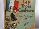 un vieux livre sur lequel figure l'image d'une femme tenant un drapeau français