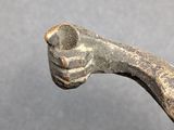 a small metal object that is sitting on a table