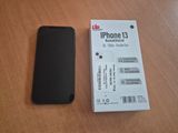 an iphone is sitting next to a box on a table