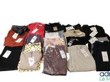 many different types of clothing on a white background