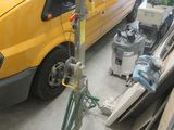 a yellow van that is parked in a garage